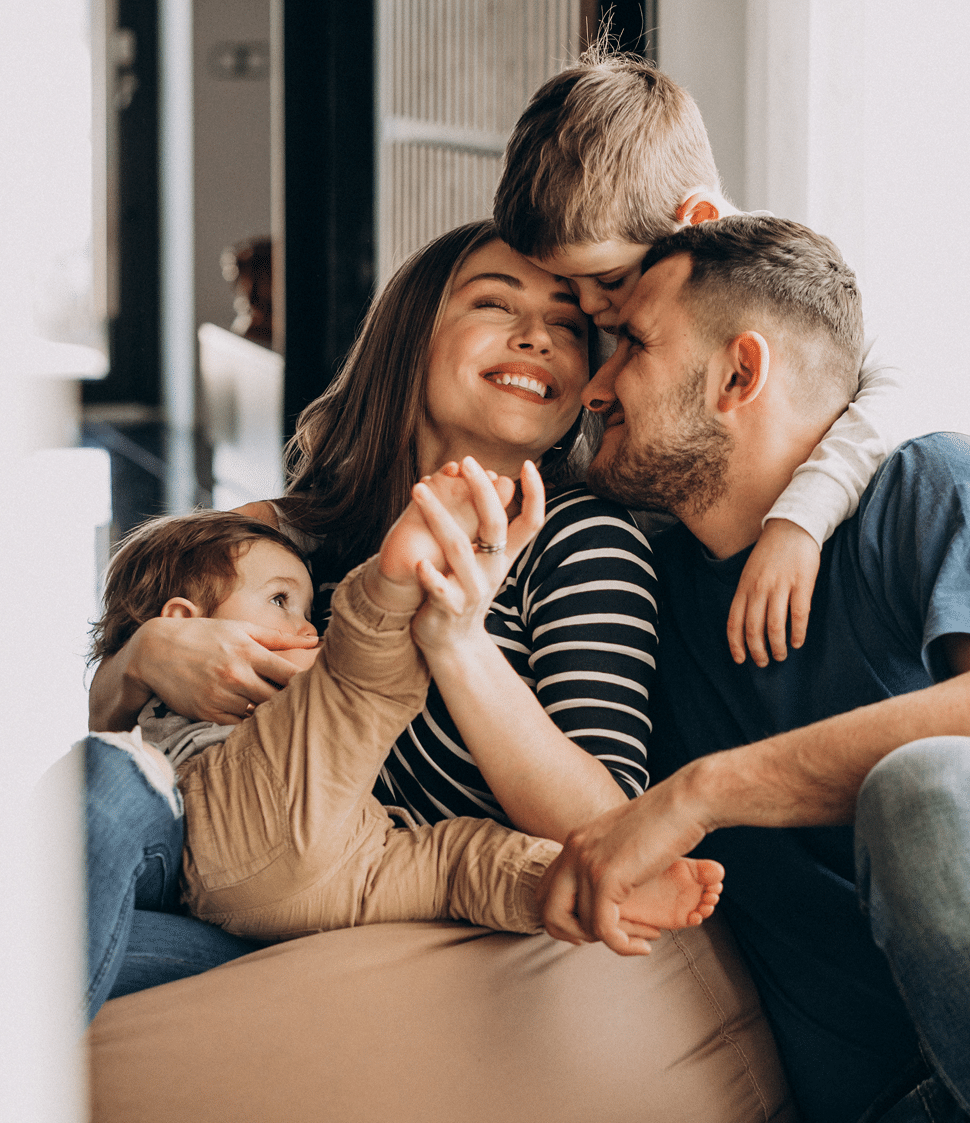 young-family-with-their-sons-home-having-fun